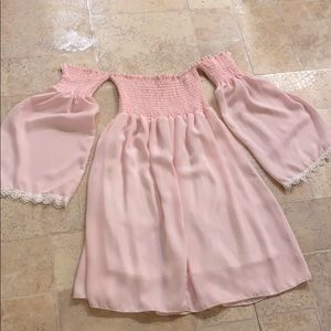 Pink flowing off the shoulder dress